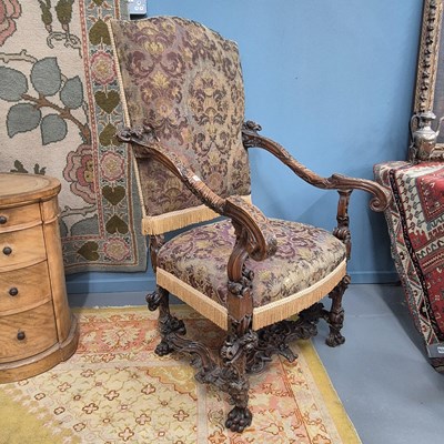 Lot 723 - An 18th-century Italian carved walnut armchair...