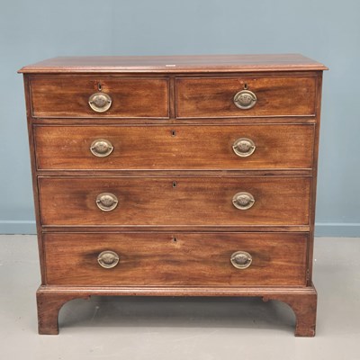 Lot 726 - An early 19th-century mahogany chest of two...