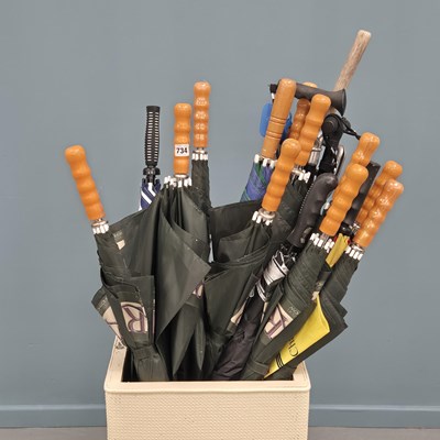 Lot 734 - A large quantity of walking sticks and umbrellas