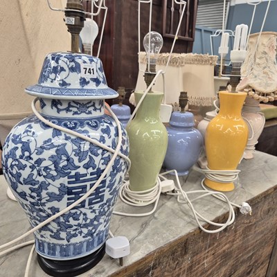Lot 741 - A group of various ceramic table lamps with...
