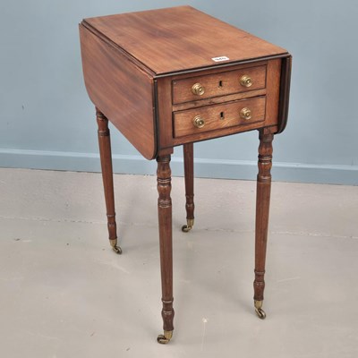 Lot 940 - A late Georgian mahogany dropleaf work table...