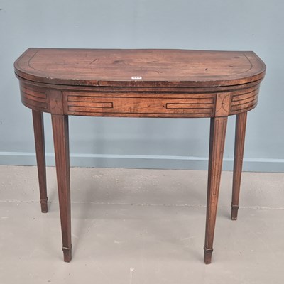 Lot 944 - A George IV mahogany and ebony strung D form...