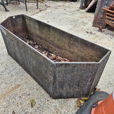Lot 485 - An antique heavy cast iron shaped front...