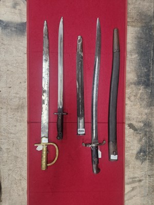 Lot 1882 - A 1856 yataghan bayonet, a Baker-type bayonet,...