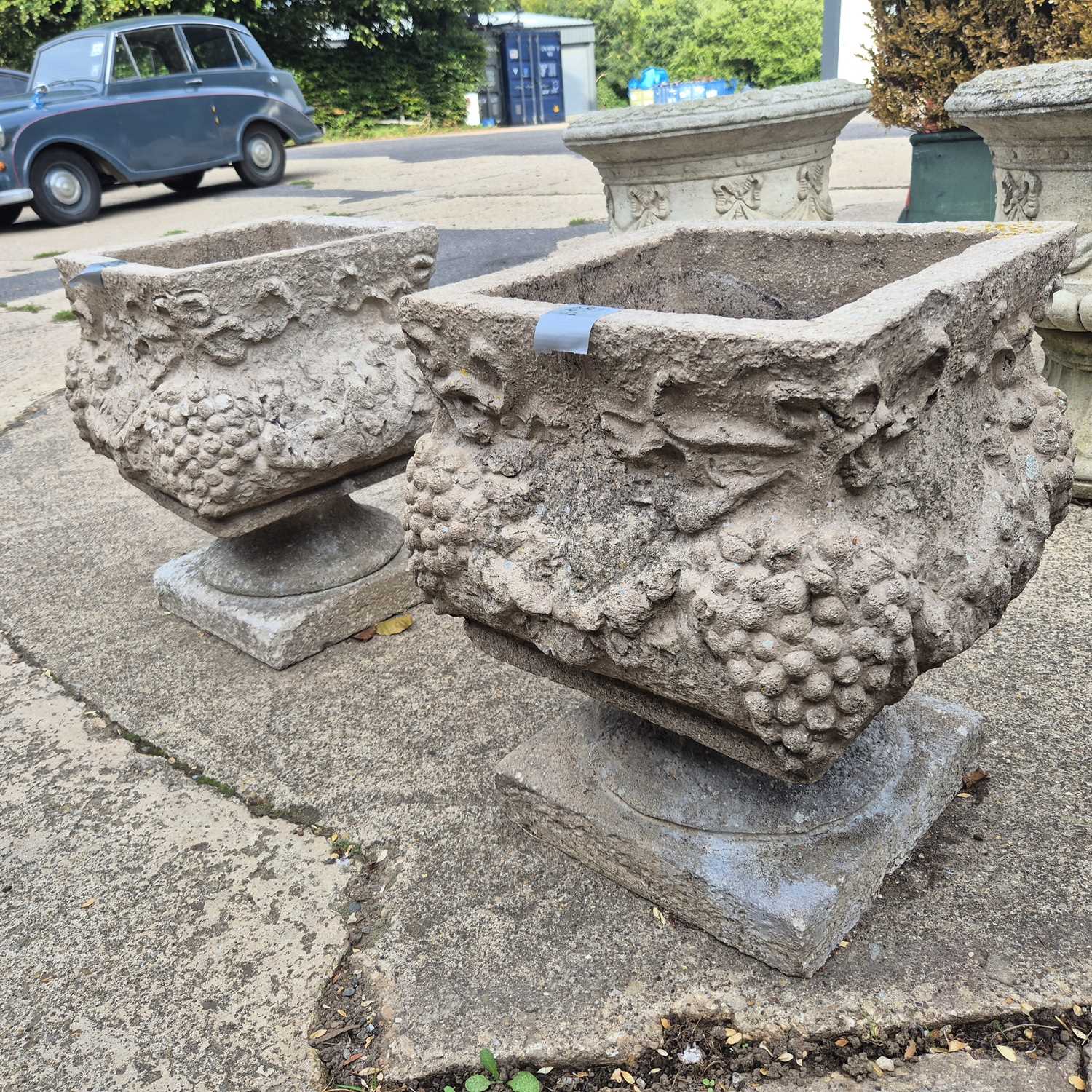Lot 1092 - A pair of large classical-style square-form