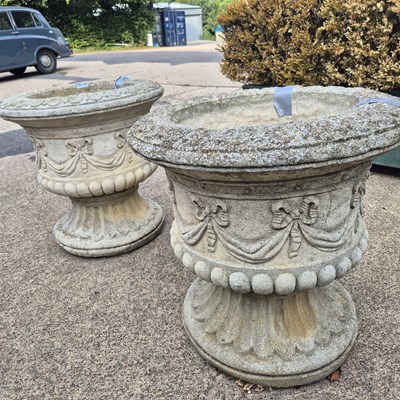 Lot 1093 - A pair of large classical-style terrace urns...