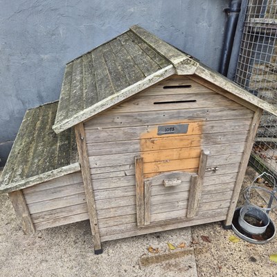 Lot 1098 - A wooden chicken hutch.
