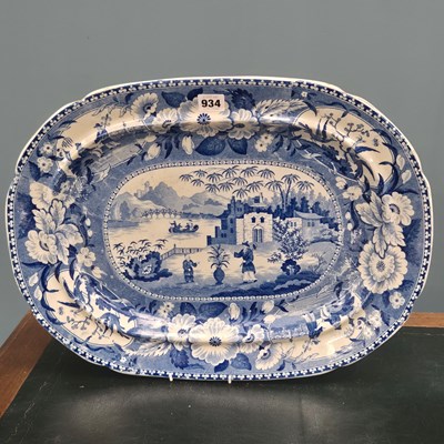 Lot 934 - A 19th century blue and white platter printed...
