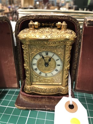 Lot 954 - A cased miniature carriage timepiece housed in...