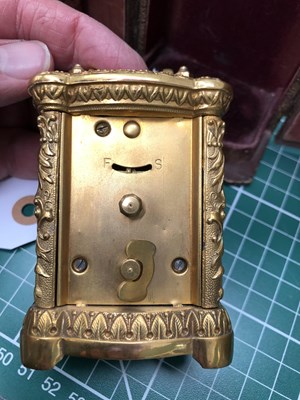 Lot 954 - A cased miniature carriage timepiece housed in...