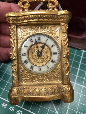 Lot 954 - A cased miniature carriage timepiece housed in...