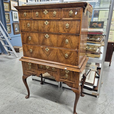 Lot 993 - An 18th century and later walnut chest on stand.