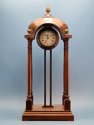 Lot 1405 - A mahogany portico-form cased gravity clock.