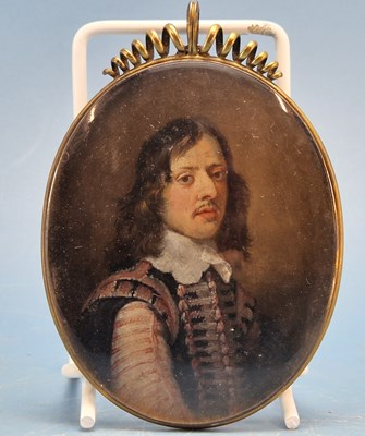 Lot 1027 - 18th-century school. A miniature portrait of a...