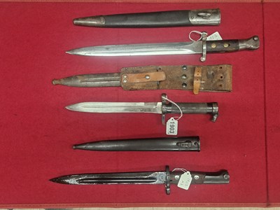 Lot 1903 - An 1888 pattern Enfield bayonet, a Swedish...