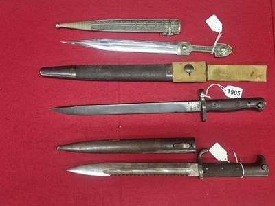 Lot 1905 - A Russian Kindjal knife, an Erfurt saw back...