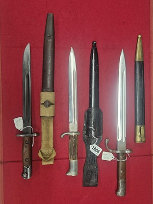 Lot 1906 - An Austrian bayonet, a Brazilian example and a...