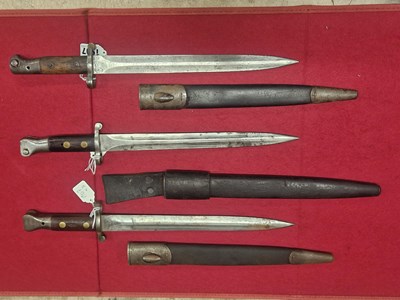 Lot 1907 - An 1888 Lee-Metford pattern bayonet, an SMLE...