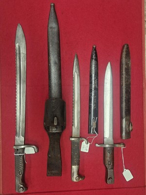 Lot 1908 - A Mauser sawback "butcher" bayonet, another...