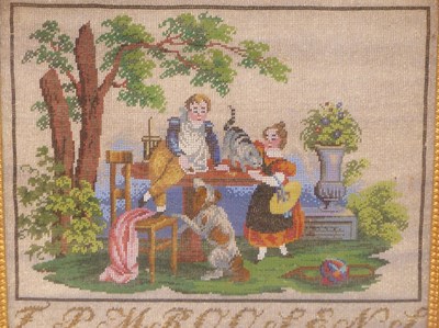 Lot 1282 - A 19th century beadwork picture of a girl and...