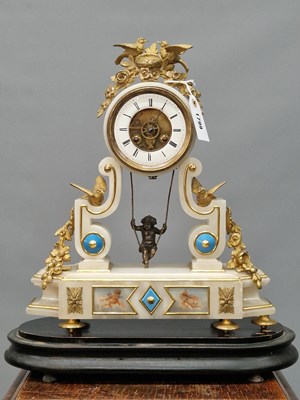Lot 1799 - An ormolu bird mounted white alabaster clock...