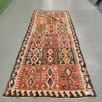 Lot 571 - An antique Turkish tribal kelim, L 137 W 330cms