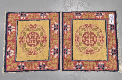 Lot 586 - An antique Tibetan rug, 112 x 59cms