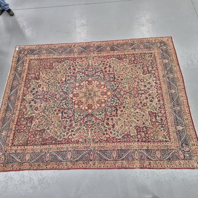 Lot 569 - An antique Persian Kirman carpet, L 345 W 260cms