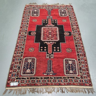 Lot 592 - An antique Caucasian rug, probably...