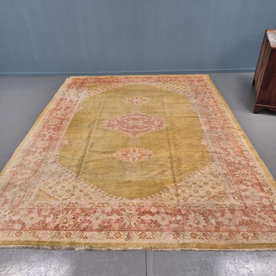 Lot 594 - An antique Turkish country house carpet, L 395...