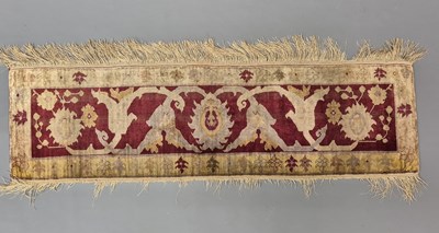 Lot 559 - An unusual antique knotted silk panel of an...