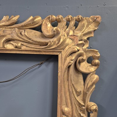 Lot 1189 - A large antique Italian carved giltwood...