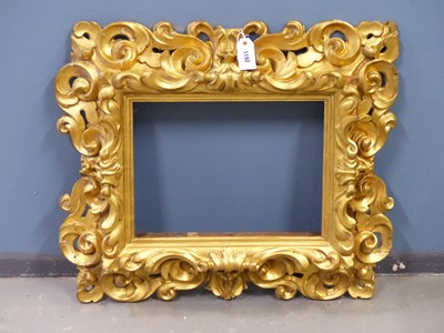 Lot 1192 - An early Italian carved giltwood baroque style...