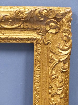 Lot 1195 - A Georgian carved giltwood frame, rebate H 77...