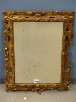 Lot 1202 - Two antique carved frames now mounted as...