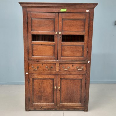 Lot 1781 - A late 18th-century Welsh oak food cupboard...