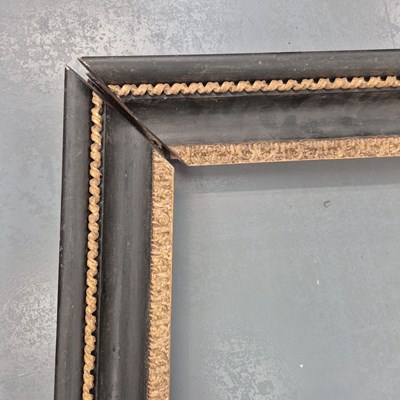 Lot 1208 - A very large ebonized and gilt picture/mirror...