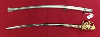 Lot 1863 - A sabre with an iron sacbbard, the gilt guard...