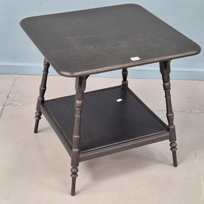 Lot 1271 - An antique ebonised two-tier occasional table...