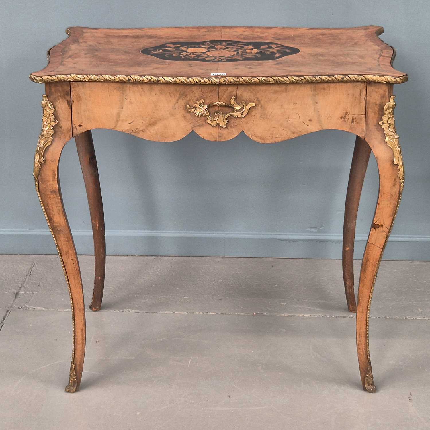 Lot 1030 - An antique walnut and inlaid side table with...