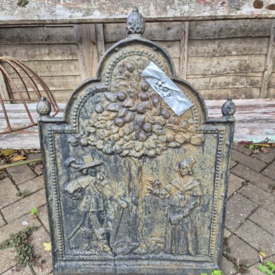 Lot 1108 - A small antique fire back decorated with...