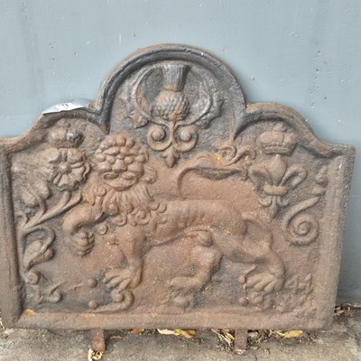 Lot 1109 - An impressive large cast iron fire back...