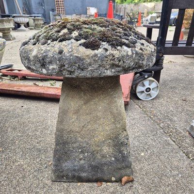 Lot 1119 - A staddle stone and cap