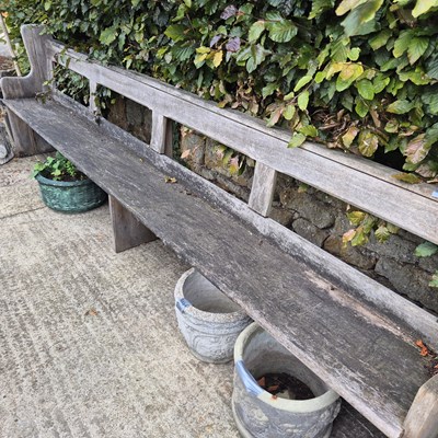 Lot 1125 - A rustic pine pew.