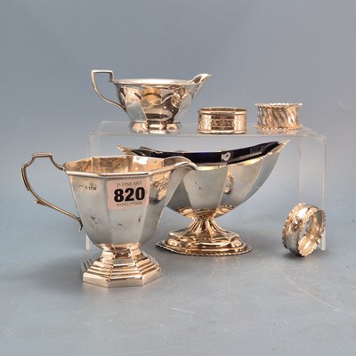 Lot 820 - A silver cream jug by John Taylor & Co,...