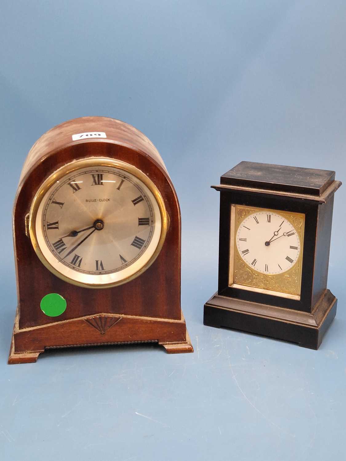 Lot 709 - A Bulle battery operated clock in a mahogany