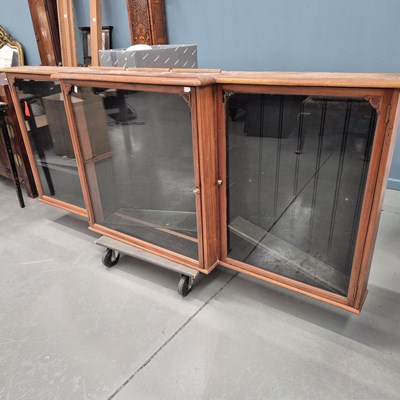 Lot 1044 - A large Victorian mahogany breakfront shop...