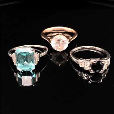 Lot 1229 - An Art Deco sapphire and diamond ring, size N,...