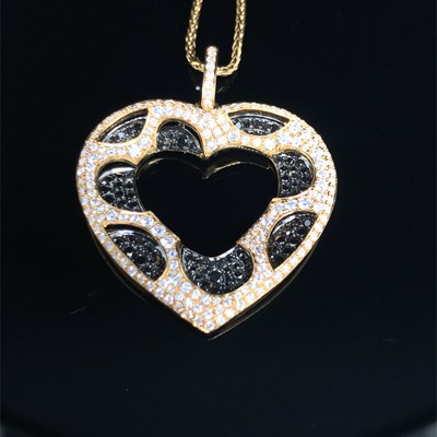 Lot 1235 - A contemporary black and white diamond set...