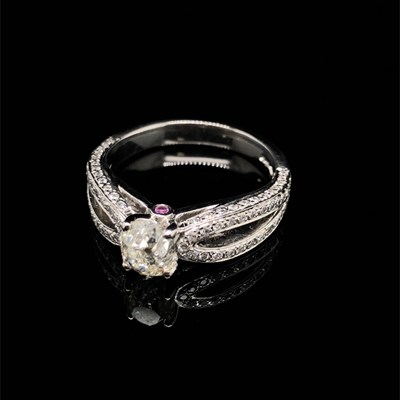 Lot 1246 - An old European-cut diamond solitaire ring...